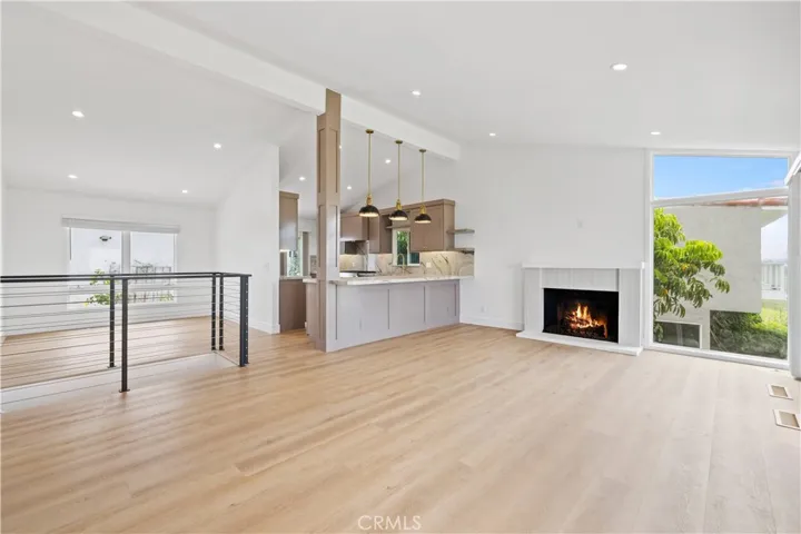 Living room views, dining room views, kitchen views.
