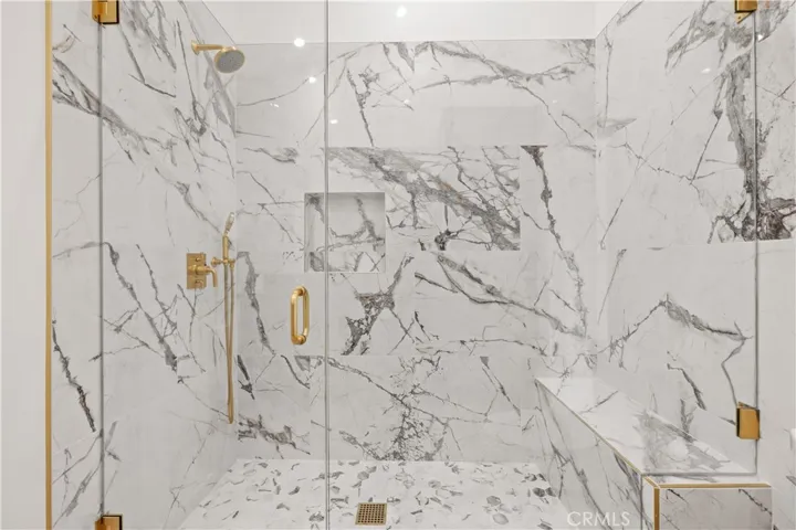 Luxurious walk-in shower.