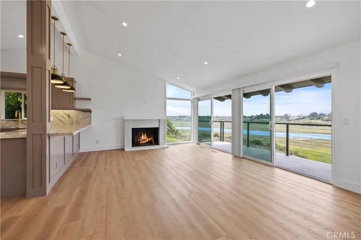 Beautiful flooring throughout and cozy fireplace.