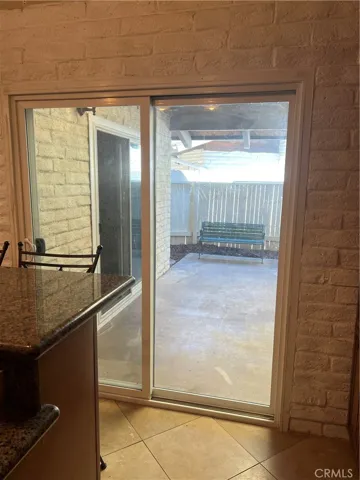 Private Patio off the kitchen complete with side grass area.