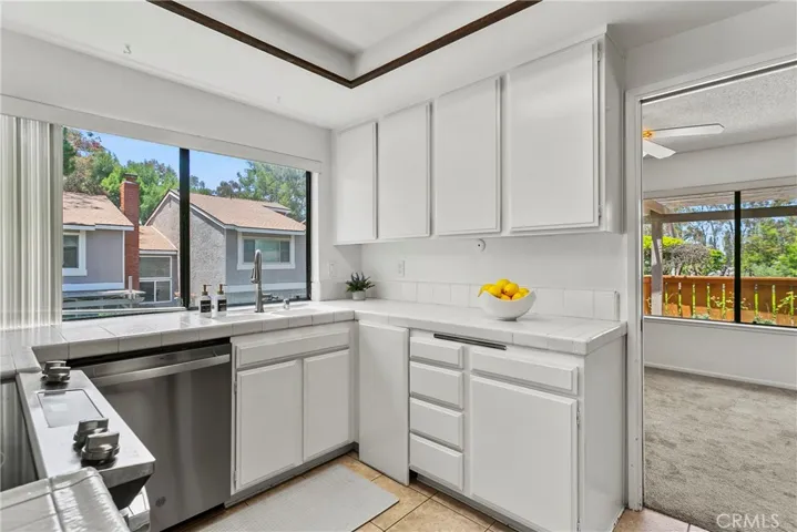 Kitchen with dining room to right