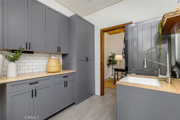 Upgraded Laundry Room with utility sink