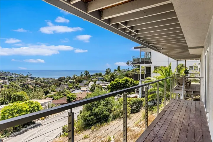 Downstairs ocean view terrace.  Sliding glass doors from bedroom open on to this relaxing terrace