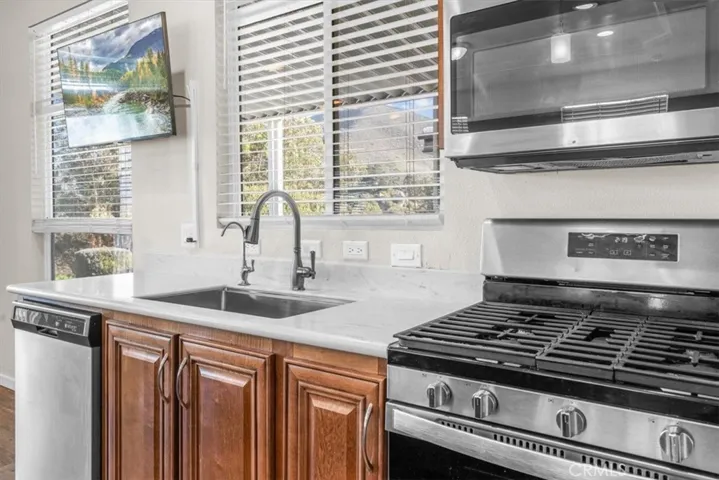 Gleaming stainless and corian counters