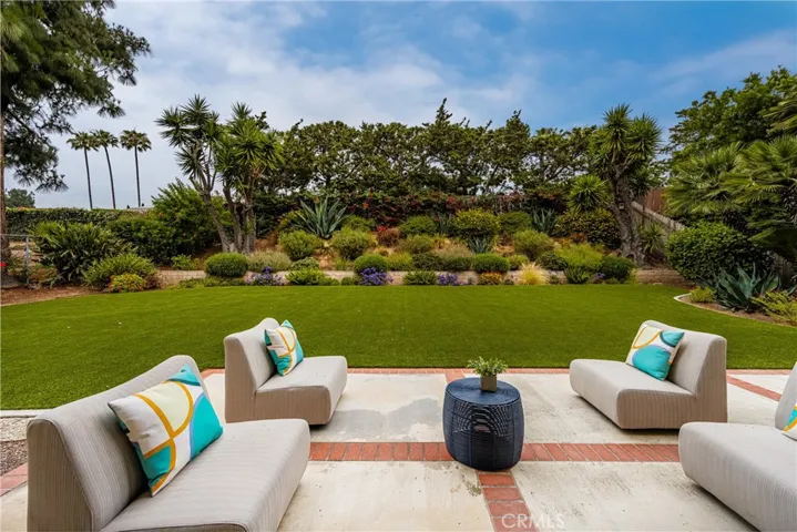 Both the family room and kitchen feature beautiful views of the backyard.