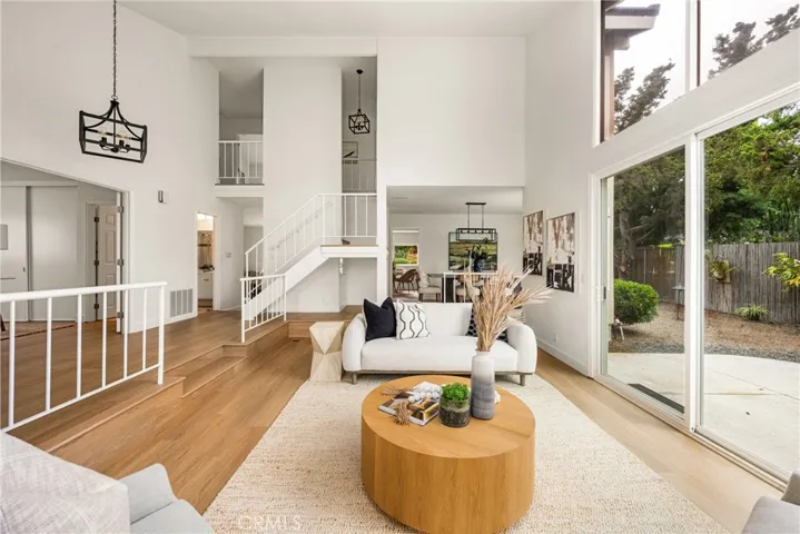 A large patio off the side of the living room adds to indoor-outdoor living.