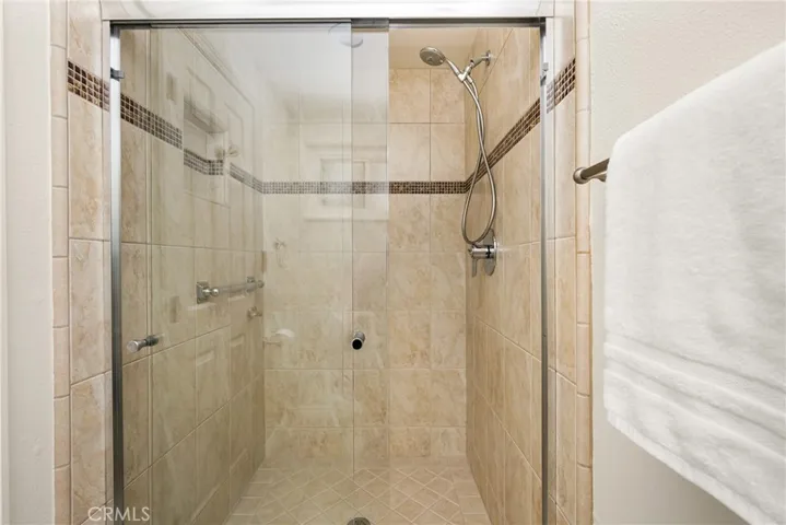 The main bath features a walk-in shower.