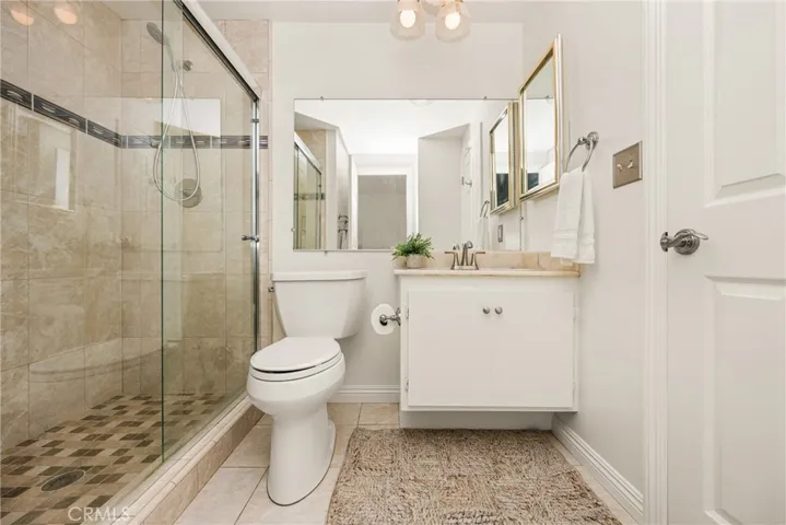 The downstairs bath features a walk-in shower..