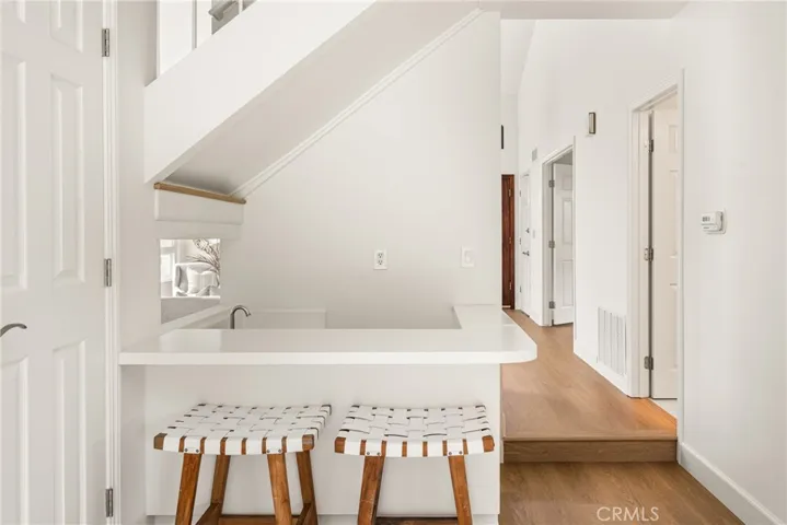 The family room features a wet bar, perfect for entertaining family and friends.
