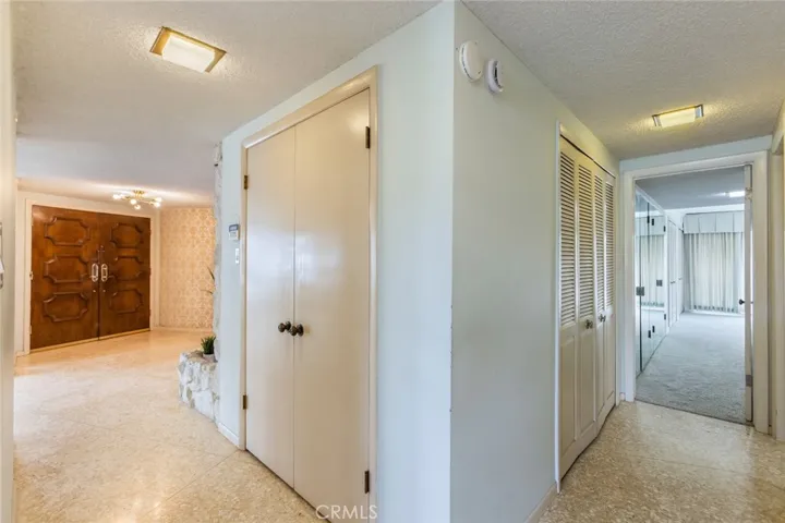 Terrazzo flooring in the entry and hallways to the bedrooms