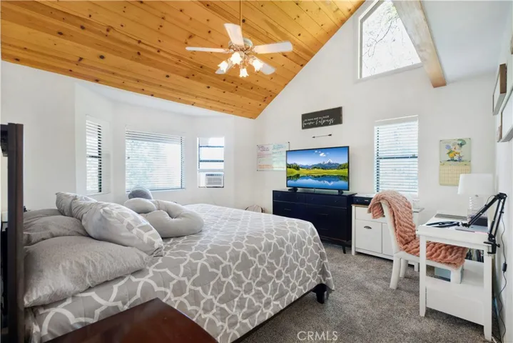 primary bedroom suite with walk in closet and bathroom