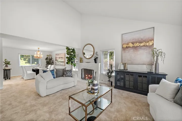 Step inside to a freshly updated interior showcasing an updated kitchen, new carpet and luxury vinyl flooring.