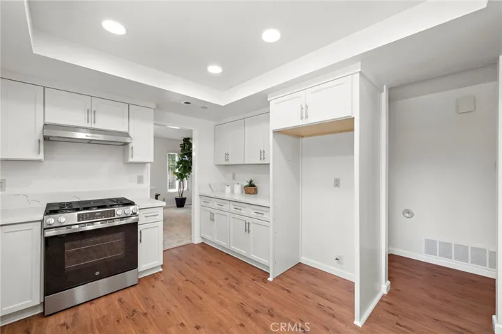 The kitchen also features new stainless-steel appliances including a gas stove oven/convention oven with air-fry, and dishwasher.