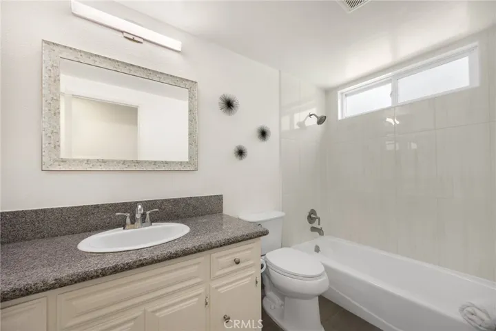 upstairs bathroom, new tile floors and shower tile.