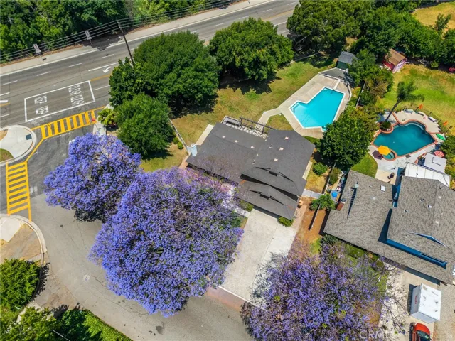 1/2 acre lot, spacious pool home, tree lot.