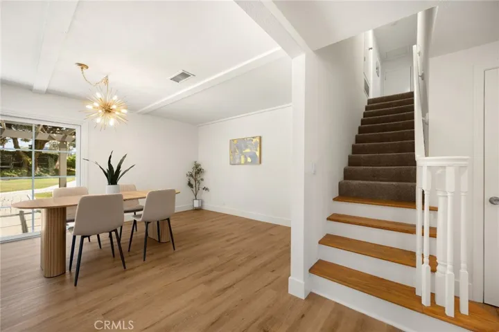 stairs leading to 3 other bedrooms