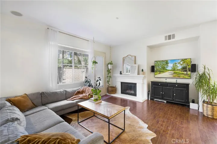 Living rooms leads out to the backyard.
