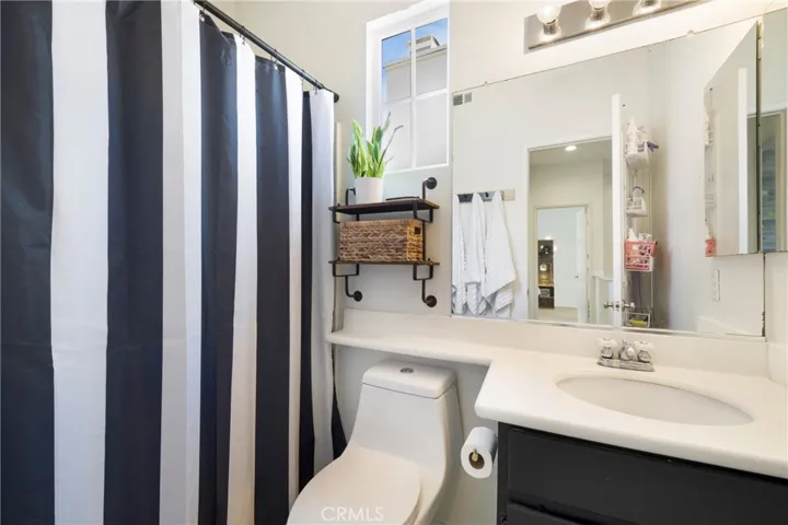 Secondary upstairs bath.