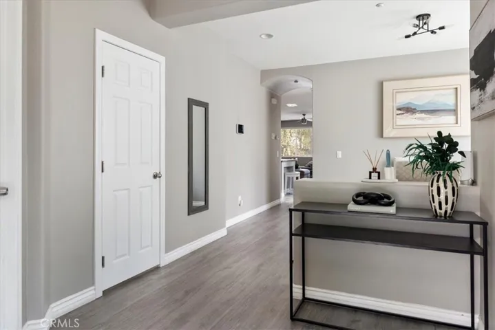 Step into a welcoming foyer that sets the tone for the rest of the home with its clean lines, neutral palette, and contemporary finishes.