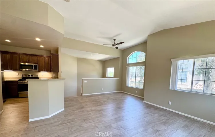 Open floor plan with wood-look tile