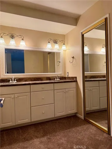 Owner's suite bath with dual vanities.