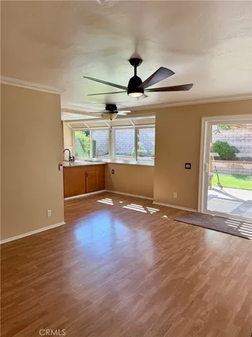 Living area opens to the kitchen.