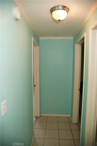 Hallway to bedroom #2 to the left and bedroom #3 to the right.