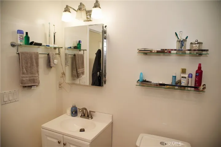 New vanity cabinet, sink and faucet.