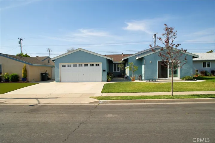 Extra wide concrete driveway.