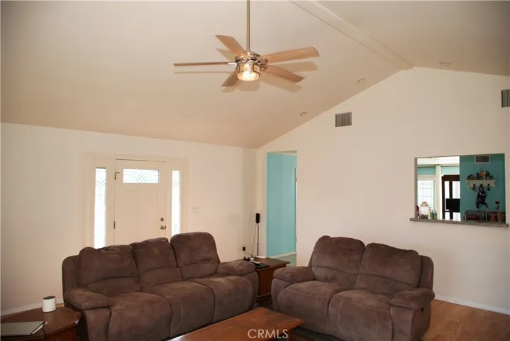 door to the right leads to the kitchen. Nice pass through or breakfast bar.