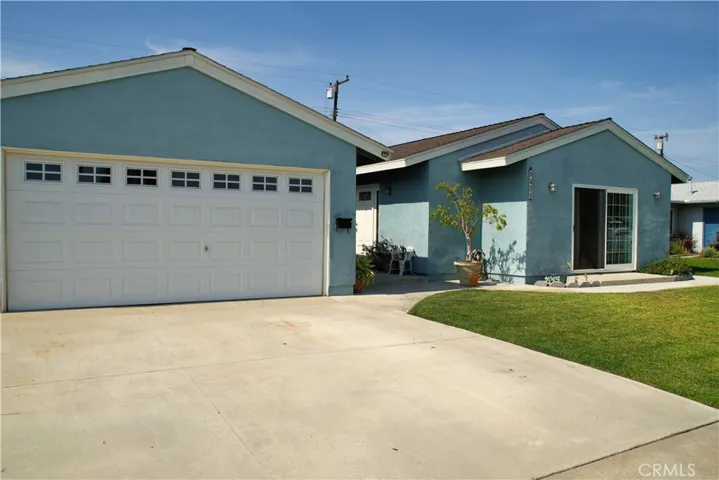 Nace lawn with sprinklers.