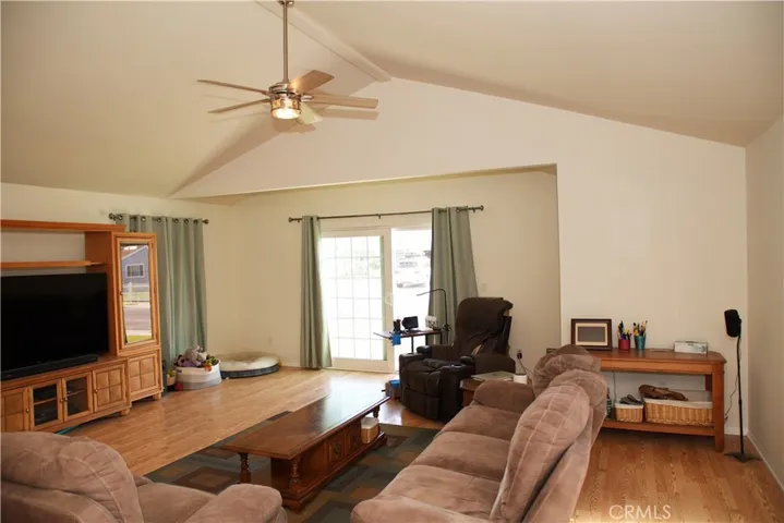 Front door is to the right. New ceiling fan.