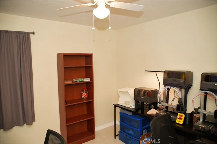 Bedroom #1 with ceiling fan.