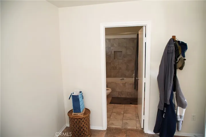 Primary suite en-suite door.