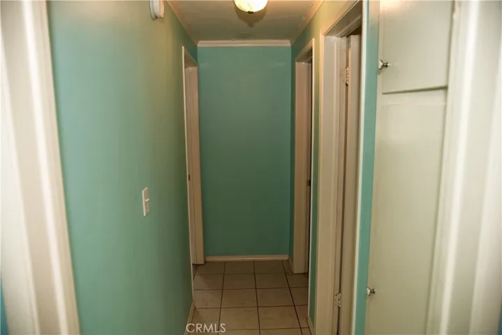 Door to bedroom #2 down hallway to the left. Bathroom to the right