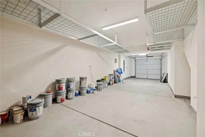 Tandem two car garage plus overhead storage and a EV Plug