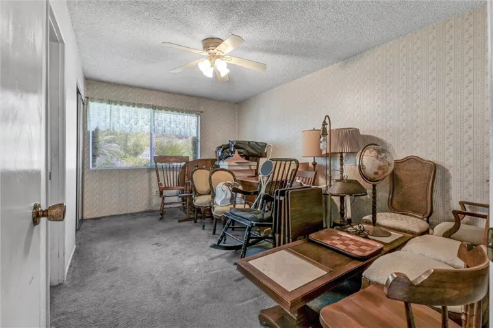 Primary suite w/2 mirrored wardrobes.