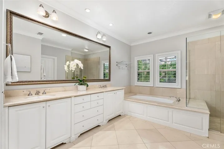 Primary bath is HUGE with custom tub & shower