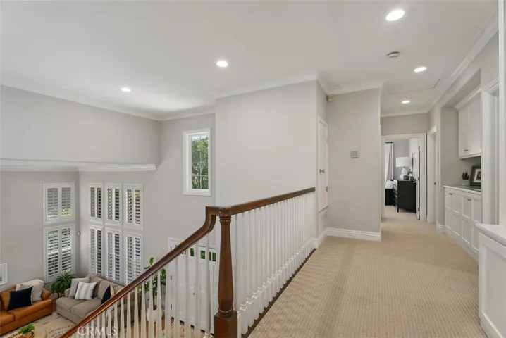 Open upstairs hallway looking down to living area