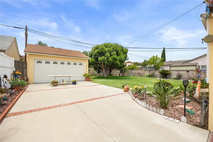 Detached garage and spacious backyard