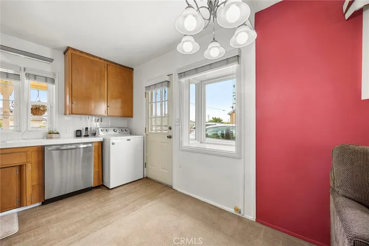 Kitchen with view of side door, direct access to driveway