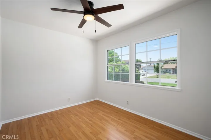  Each bedroom features hardwood flooring and brand-new ceiling fans for comfort and style.