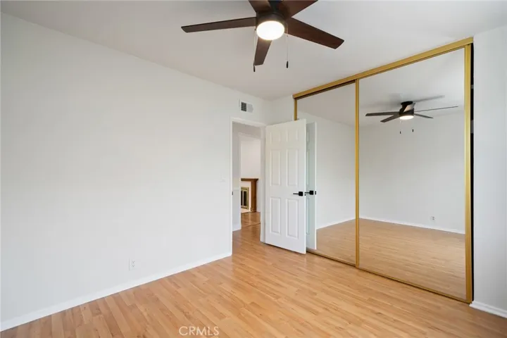  Each bedroom features hardwood flooring and brand-new ceiling fans for comfort and style.