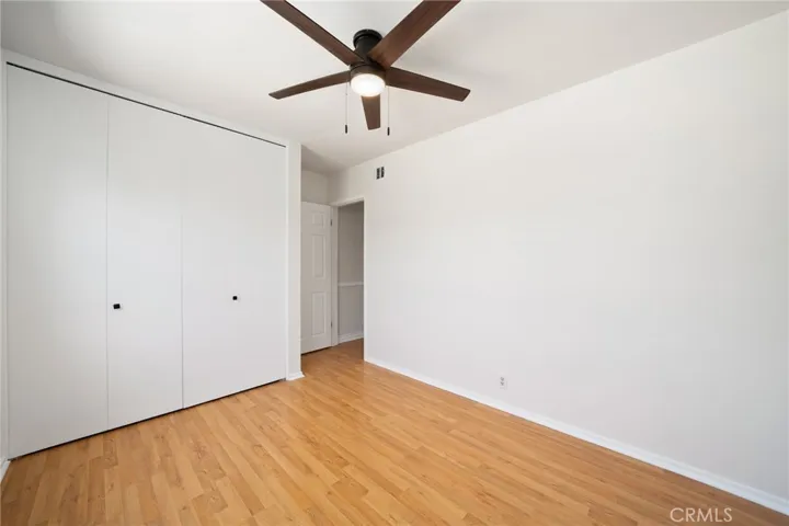  Each bedroom features hardwood flooring and brand-new ceiling fans for comfort and style.
