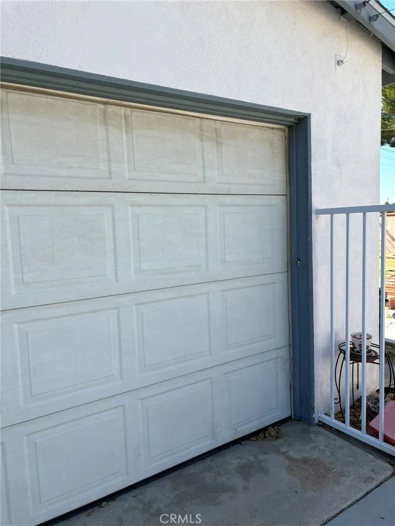 View of 2 car detached garage door.