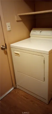 Dryer in laundry​​‌​​​​‌​​‌‌​​‌​​​‌‌​​​‌​​‌‌​​‌‌​​‌‌​​​​ area.