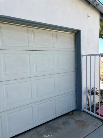 View of 2 car detached garage door.
