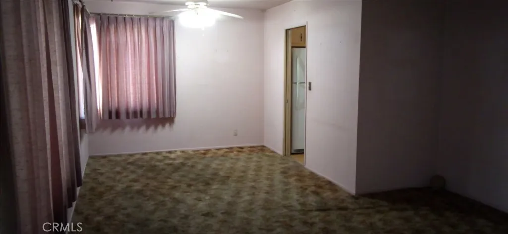 Dining area next to kitchen doorway.