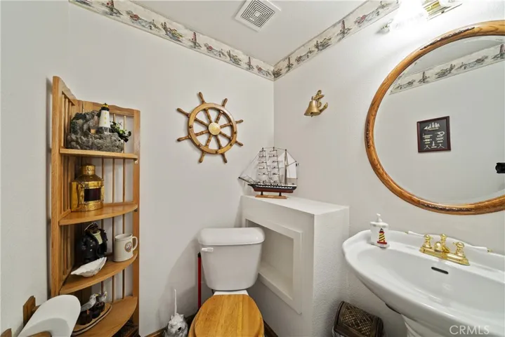 HALF BATH IN GAME ROOM