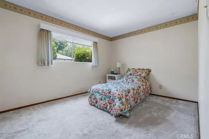 Bedroom 2 is on front corner of house with window onto side yard
